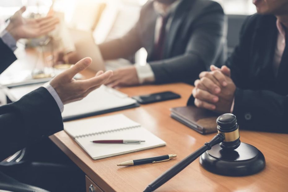 businessman and lawyer discuss lawsuits in the off 2023 11 27 05 20 06 utc